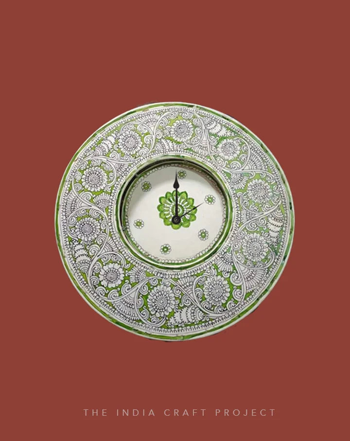 Hara Bageecha hand-painted Tholu wall clock with lush green floral and leafy motifs, ideal for nature-inspired decor