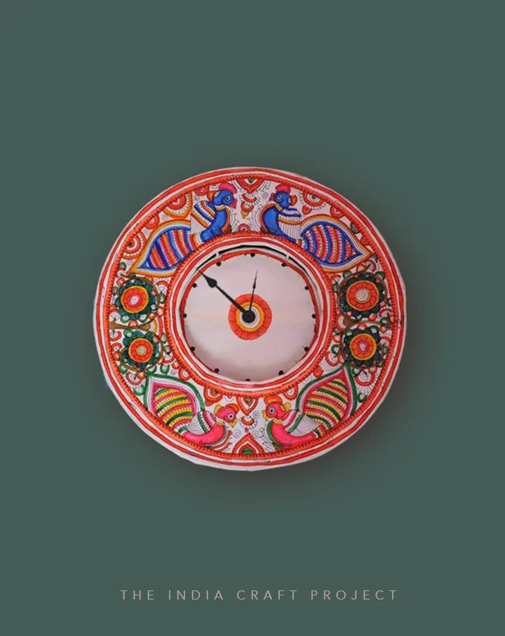 Phool Bageecha hand-painted Tholu wall clock with intricate floral patterns, offering a vibrant artisan decor piece