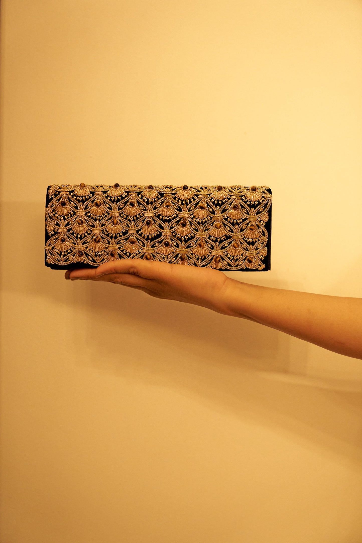 Jhoomar Zardozi clutch purse with intricate gold embroidery and handcrafted details, perfect as an elegant evening bag