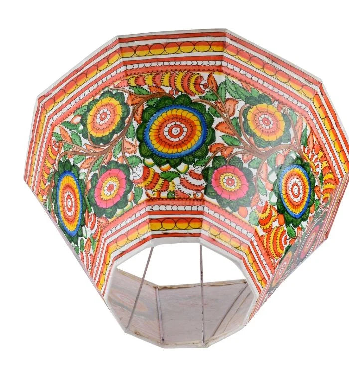 Bageecha hand-painted Tholu lampshade with floral motifs, adding warm artisan charm to your lighting