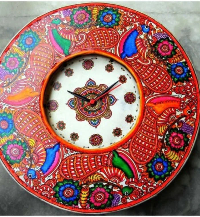 Peacock hand-painted Tholu wall clock featuring a vibrant peacock design with intricate detailing for elegant decor