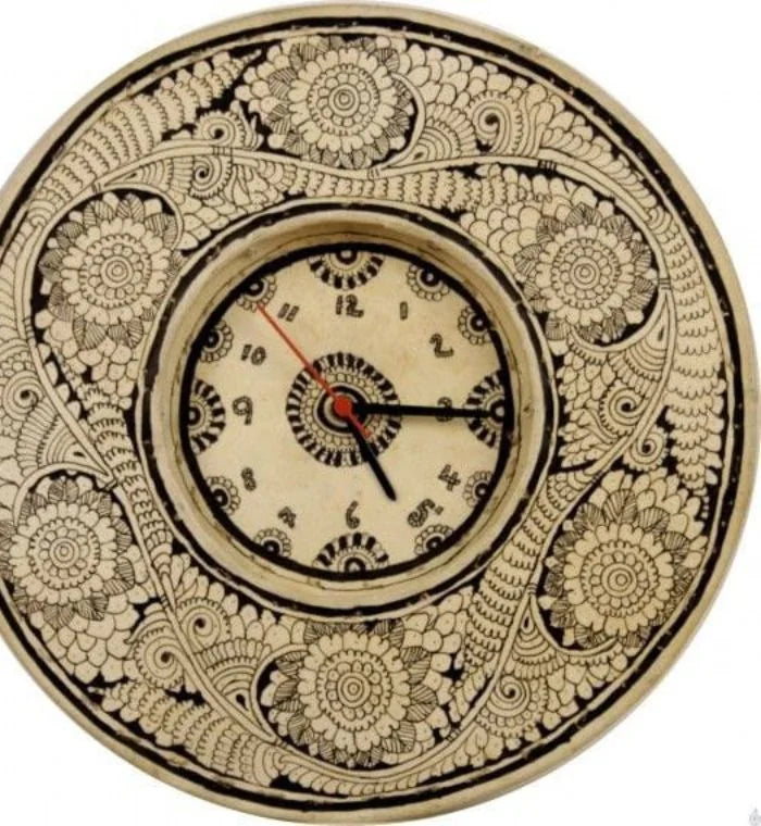 Garden hand-painted Tholu wall clock with lush floral and leafy patterns, bringing natural elegance to your walls