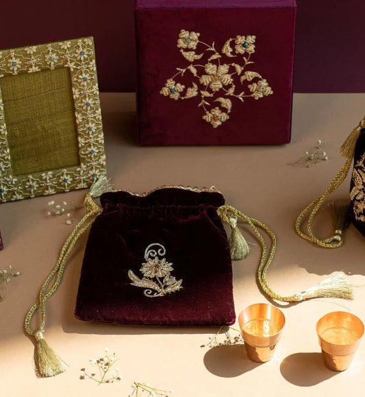 Phool small potli in burgundy with intricate Zardozi embroidery, a handcrafted luxury bag for festive occasions
