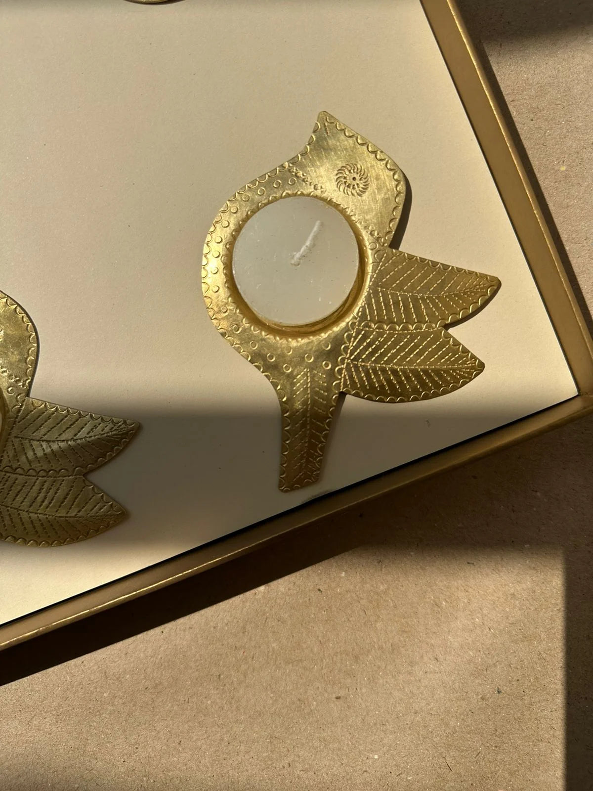Ramya gift box featuring Chidiya brass tealight holders and TICP playing cards, a unique handcrafted gift set