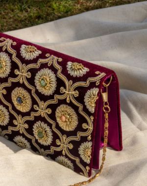 Kat Jaal Zardozi sling purse with detailed gold embroidery, offering a handcrafted and stylish touch
