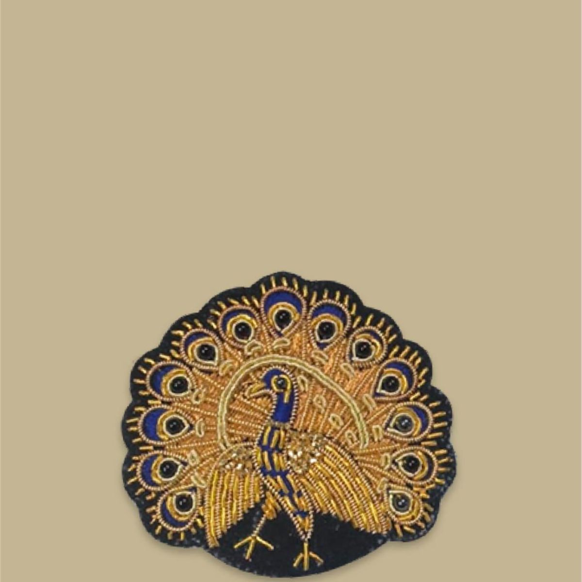 Mor unisex Zardozi brooch featuring intricate handcrafted embroidery, a versatile and stylish accessory