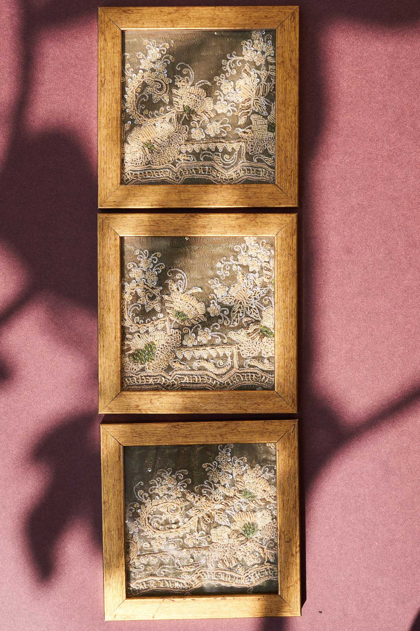 Hariyali vintage Zardozi coasters, set of 2, featuring intricate gold embroidery on rich fabric, adding a touch of handcrafted elegance to your decor.