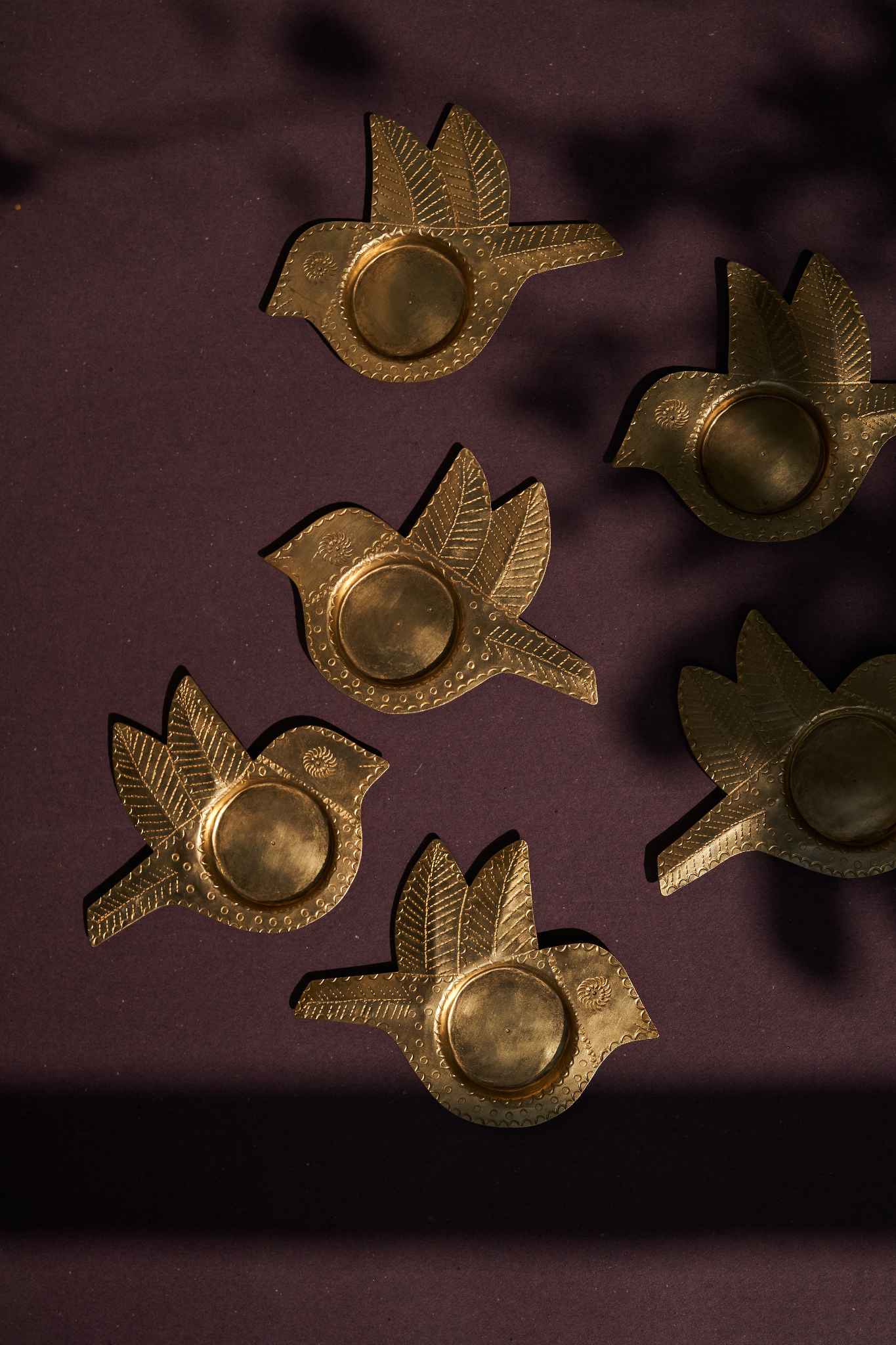 Chidiya brass tealight holders, set of 2, featuring elegant handcrafted details for warm, stylish decor