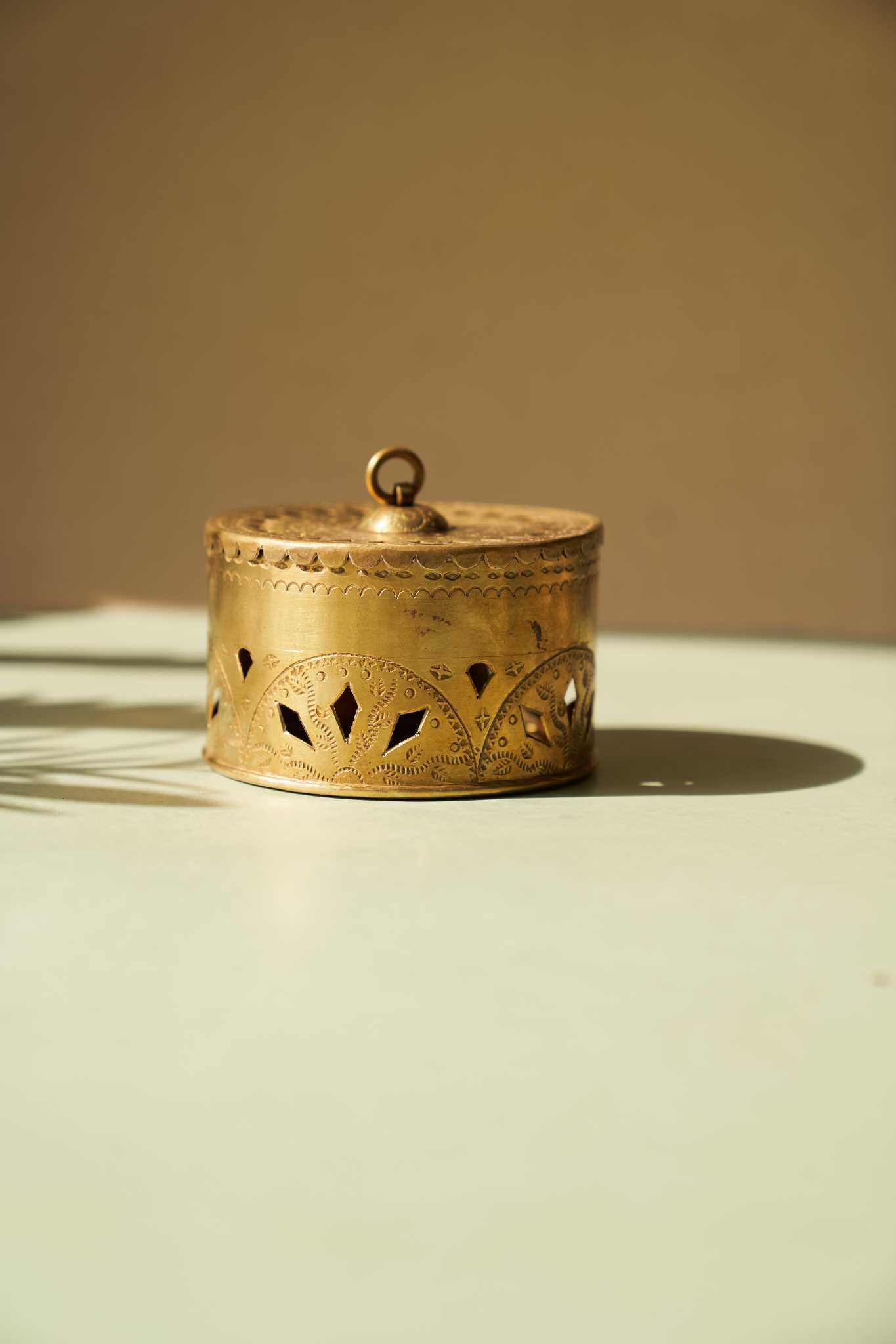 Ziya brass dibbi, a handcrafted luxury storage box with elegant detailing
