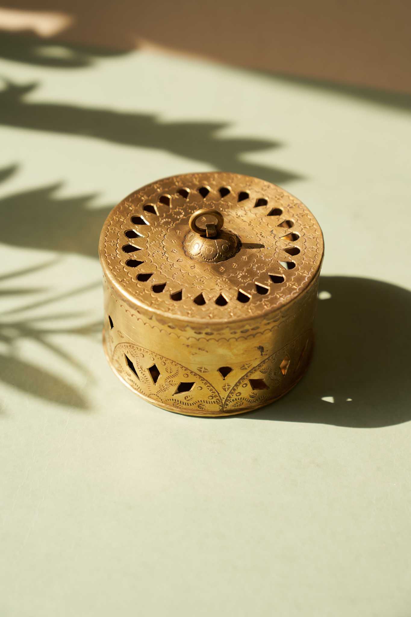 Ziya brass dibbi, a handcrafted luxury storage box with elegant detailing