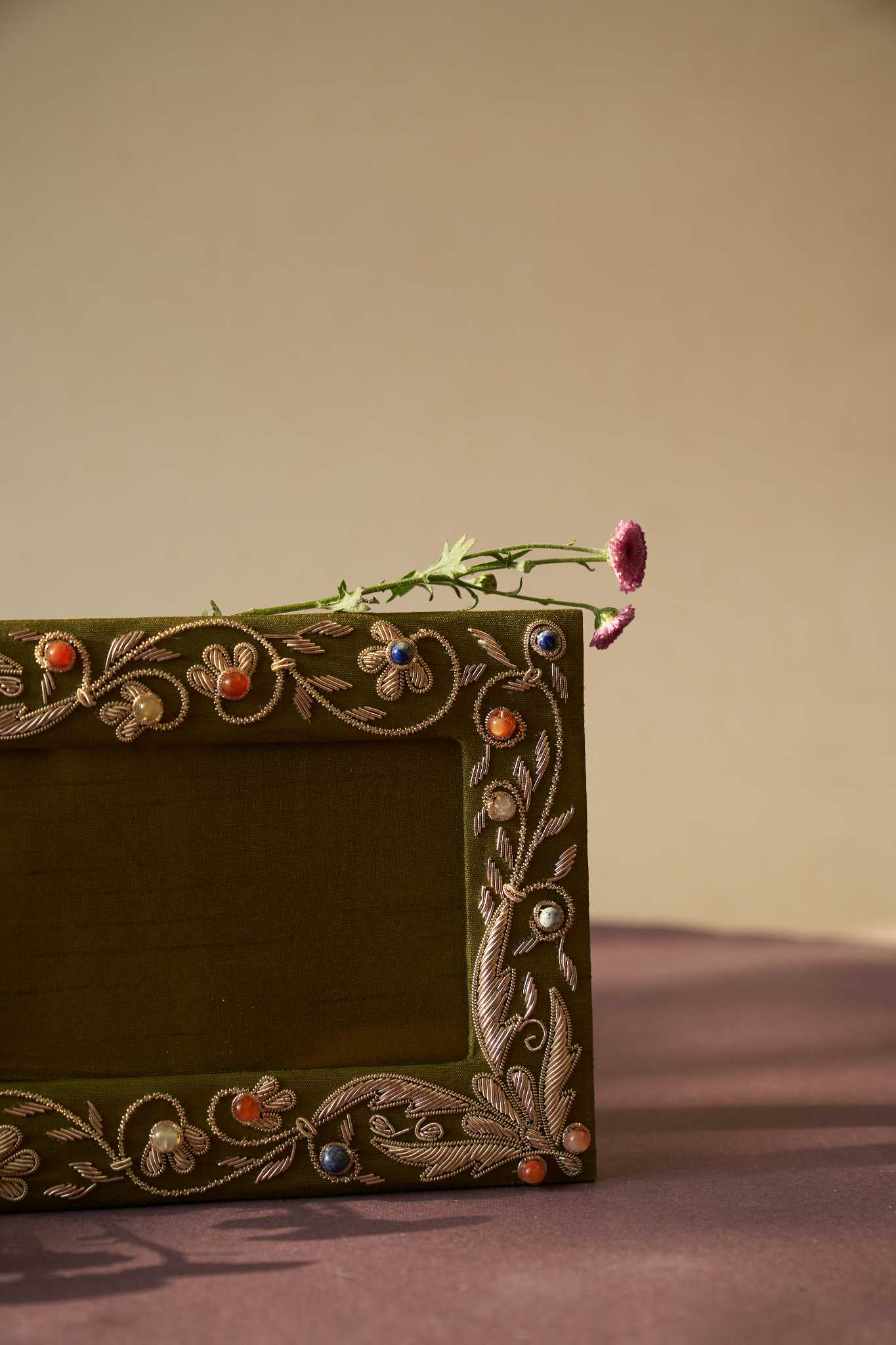 Bel Green Zardozi photo frame featuring elegant handcrafted embroidery with intricate gold and silver threadwork, accentuated by delicate bead and sequin details. A sophisticated decor piece perfect for displaying cherished memories in a luxurious setting.