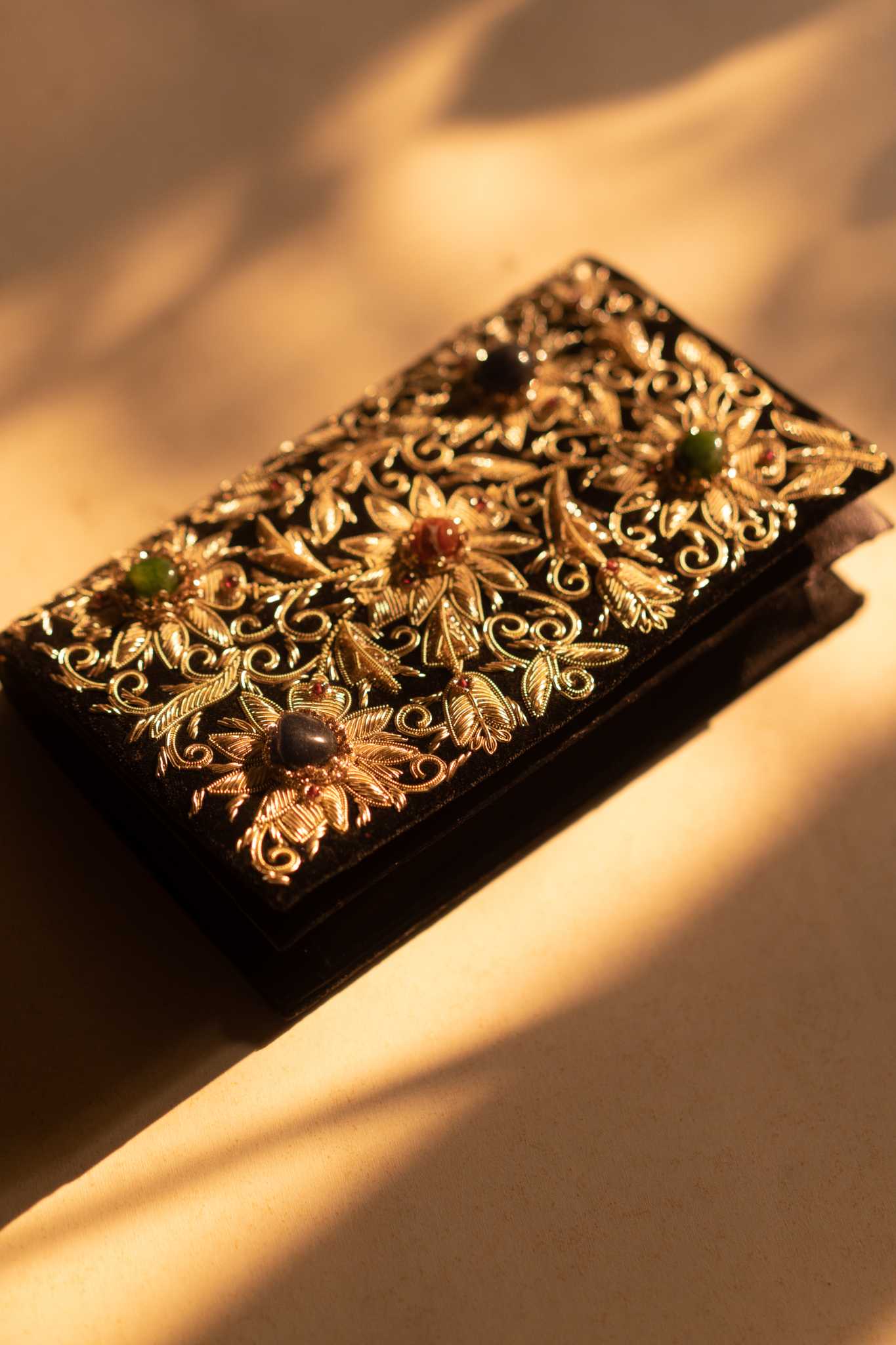 Kamal Zardozi sling purse with intricate gold embroidery, a handcrafted and elegant accessory for special occasions