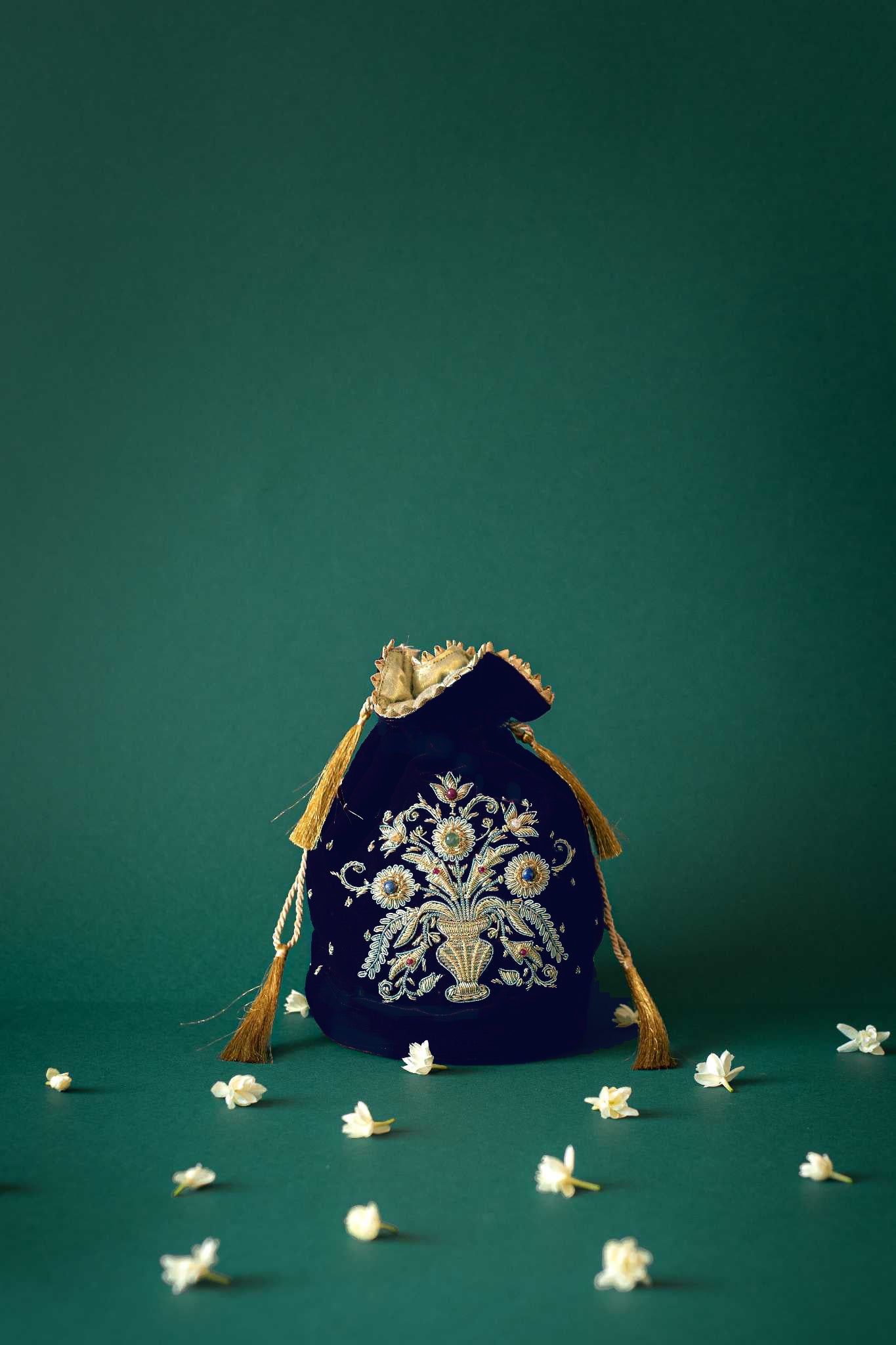 Guldasta medium Zardozi potli bag, featuring intricate gold embroidery with handcrafted floral and bead accents, perfect for elegant occasions