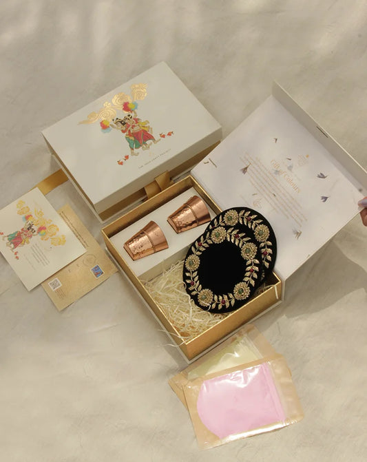 Parv festive gift box with copper shot glasses and coasters, a handcrafted set for elegant celebrations