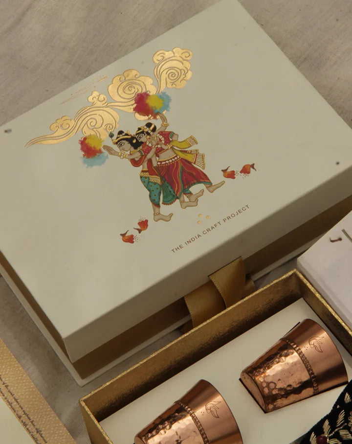 Parv festive gift box with copper shot glasses and coasters, a handcrafted set for elegant celebrations