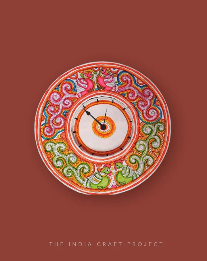 Chidiya Bageecha hand-painted Tholu wall clock featuring intricate bird and floral patterns, a perfect artisan decor piece