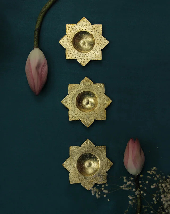 Kamal brass tealight holders, set of 2, showcasing elegant handcrafted designs for refined decor