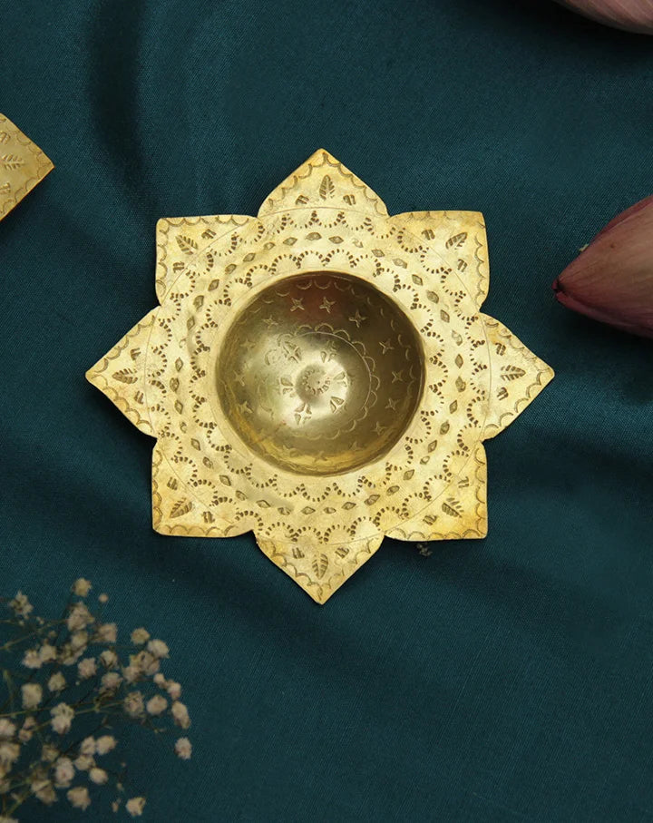 Kamal brass tealight holders, set of 2, showcasing elegant handcrafted designs for refined decor