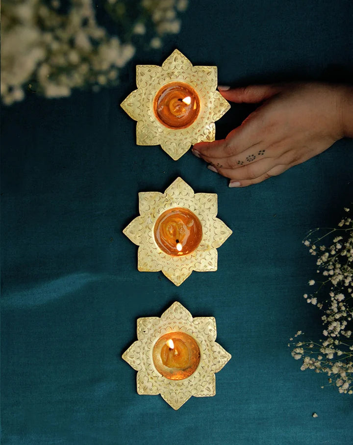 Kamal brass tealight holders, set of 2, showcasing elegant handcrafted designs for refined decor