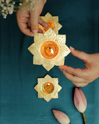 Kamal brass tealight holders, set of 2, showcasing elegant handcrafted designs for refined decor