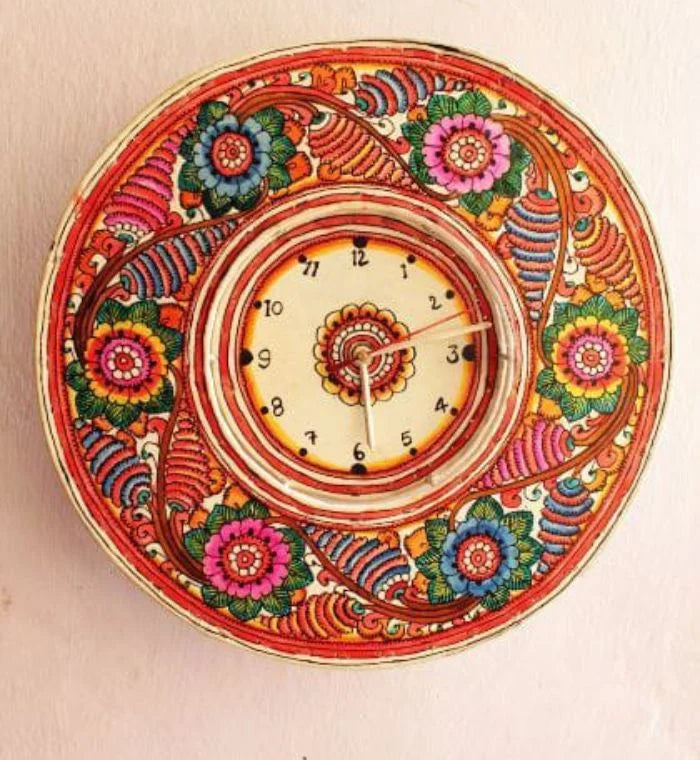 Phool hand-painted Tholu wall clock showcasing bold floral patterns, adding handcrafted charm to your walls