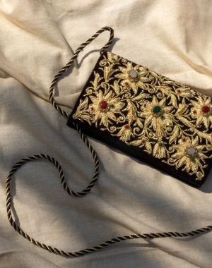 Kamal Zardozi sling purse with intricate gold embroidery, a handcrafted and elegant accessory for special occasions